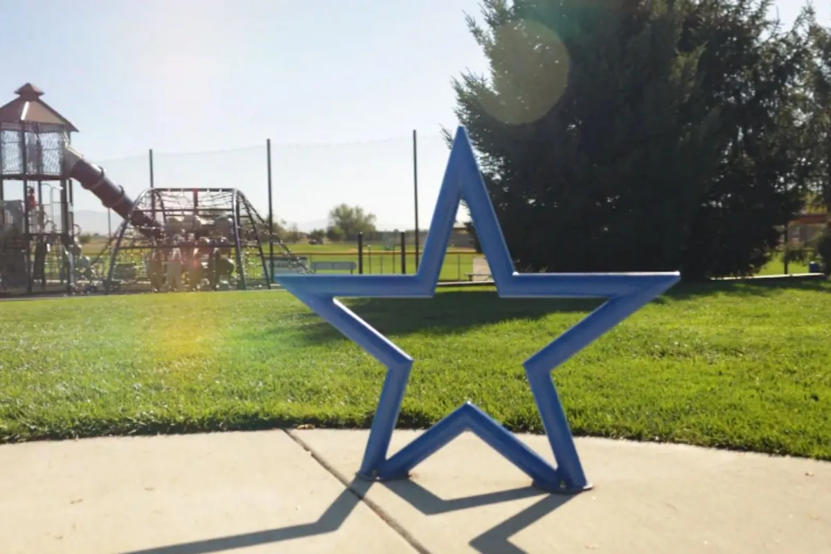 Blue star sculpture on a lawn in Star, Idaho